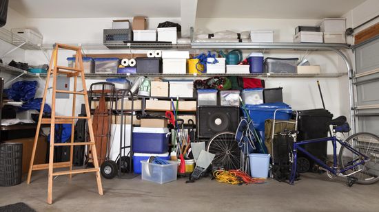 A garage that has a large amount of waste ready to be disposed off by our team
