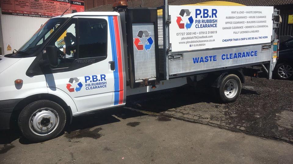 the PB Clearance van with a large load in the back