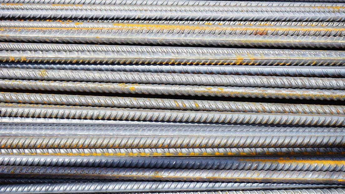 a pile scrap metal rods